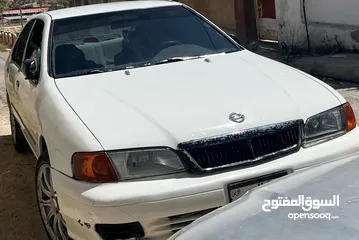  7 نيسان صني 1999 وارد ياباني ماتور 1500 قطارة بنزين ...... قابل للتفاوض والشرا ما بقصر معه ...