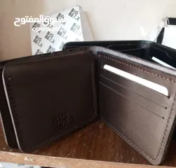 19 محل ملابس قطنيات اصلية واحذية طبية جلد اصلي