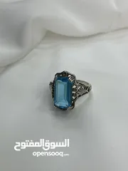  13 *خاتم فضة بحجر أكوامارين – عيار 925، وزن 5.4 جرام