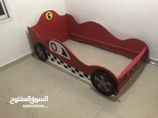  1 single bed shaped as car     good condition in mahboula