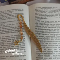  19 مراية كف وفواصل كتب بالخرز