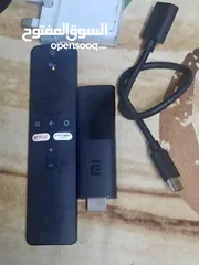  1 MI TV box with Hdmi connector and charger