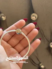  17 اساور باندورا الاصليه فضة و دهبي شامل الفل بكج