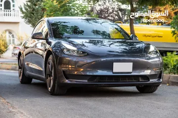  2 تيسلا model 3  tesla 2023 ستاندر  فحص كامل بحاله الوكاله  لون فيراني