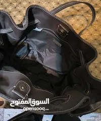  1 شنطه نسائيه مشاركه كارولينا هيريرا