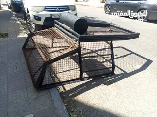  1 رول بار مع سلة وشبك (غرفة شبك) لبك اب ميتسوبيشي من موديل 2000 ولغاية 2006 بحالة الوكاله