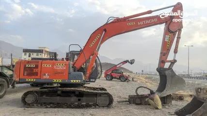  2 Hitachi 240 with NPK breaker