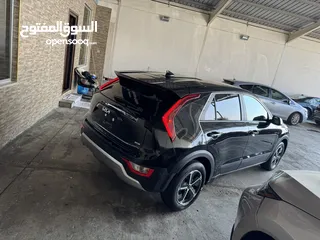  9 كيا نيرو هايبرد لون اسود 2024