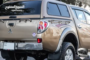  16 Mitsubishi L200 2013   البكب بحالة ممتازة