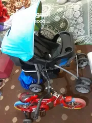  1 عربانه اطفال مع دراجه