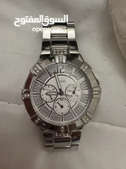  4 ساعه guess اصليه لون فضي