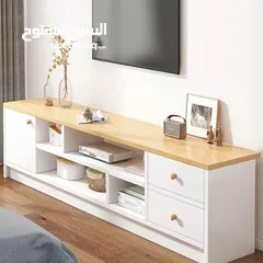  1 طاولة تلفزيون بلون أبيض وخشبي بتخطف الأنظار! المقاس 160*30*40 سم تصميم مودرن وعصري