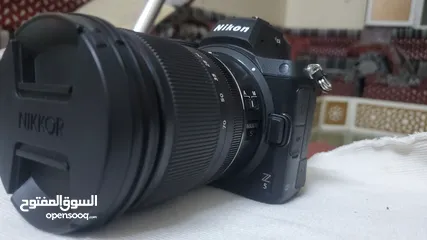  4 كاميرا نيكون Z5 مع العدسة الوكالة + جهاز لاقط الفيديو لاسلكي