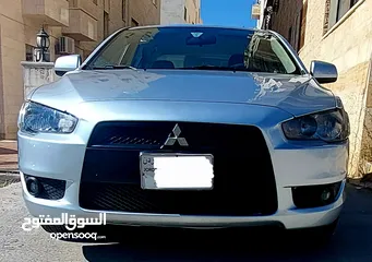  6 ميتسوبيشي لانسر 2014 بحال الوكالة