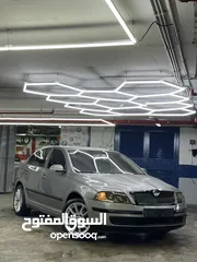  2 سكودا اوكتافيا بنزين اوتماتيك اصل حكومي مطور 1.6 بحالة الوكاله موديل 2007