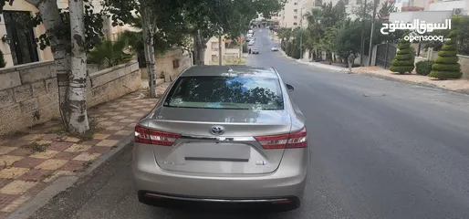  8 تويوتا افالون هايبرد 2015 فل كامل وأعلى صنف Limited وارد و مواصفات أمريكيه مالك واحد فحص كامل