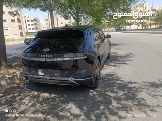  5 سياره موديل 2022 ايونك 5 كهربائيه لون اسود ميتاليك دفع رباعي اكبر بطاريه تمشي فوق 550 كيلو سبعه جيد