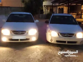  1 كيا سيراتو 2006 مع هديه كيا 2007