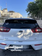  5 كيا نيرو 2019 -الاتصال على رقم الوطنيه في الوصف
