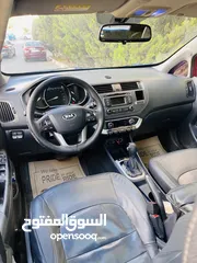  11 كيا ريو / برايد 2015 فل اضافات مع فتحة سقف فحص ممتاز