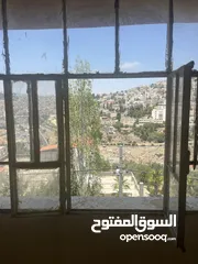  18 قطعة أرض مع منزل طابقين للبيع في مدينة السلط-نقب الدبور