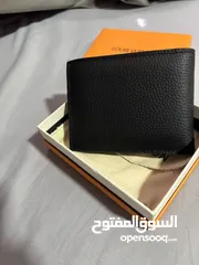  10 محفظة كوبي ماستر LVللبيع مع البكج تعبها العلبة والحافضة القماش فقط بسعر جيد جدا لون اسود