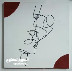  2 لوحه قماش بالخيوط والألوان احمر واسود لوحات كانسون