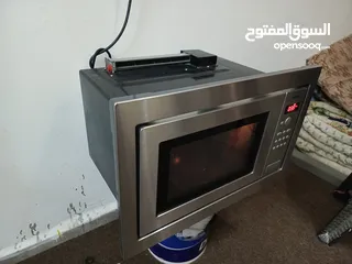  4 ميكرويف بلت أن 34لتر ستانلس كامل مع نظام شواي داخليه فخم جدا استعمال اشهر قابل للتفاوض