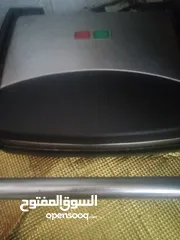  1 مكبس. توستر ساندويش نوع كونتي +مكبس توست ساندويش نوع هاوس