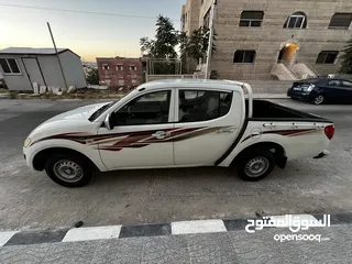  8 L200 2015 بنزين للبيع