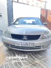 9 ميتسوبيشي لانسر موديل 2013 للبيع كاش فقط