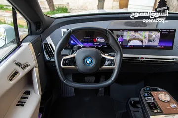  27 BMW IX40 xDrive 2023   كهربائية بالكامل  Full electric   السيارة وارد الماني
