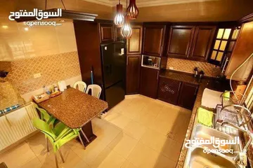  7 شقة أرضي معلق مميزة 180م داخلي / 100م خارجي في ضاحية الرشيد / ref 1857