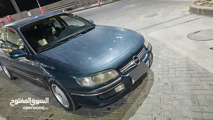  24 اوبل اوميجا للبيع السياره ب حاجه ل صيانه (القير + صنوبرصات) كاوشك جديد كراسي كهرباء السياره فحص خالي
