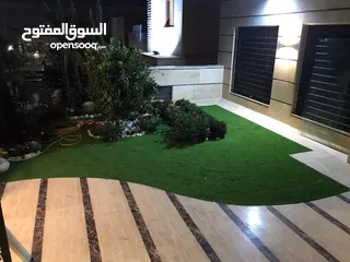  19 عشب صناعي (ترتان) وأشجار و ورد صناعي