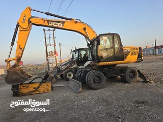  1 حفار اطارات نوع JCB