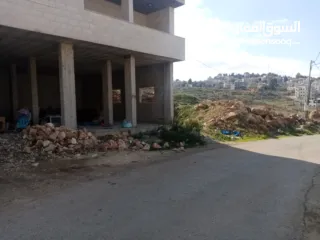  1 محلات للايجار بين قرية تل صوره على شارع مزفت 10 متر