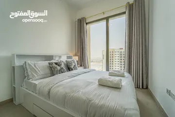  9 دبي تاون سكوير  قريب شارع حصة غرفة وصالة مفروشه سوبرلوكس مع بلكونة - ايجار شهري