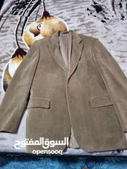  1 جاكيت بليزر  لون kamel مقاس 54 regular بحاله ممتازه