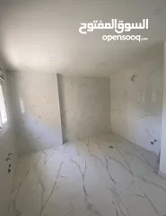 6 شقة فاخرة 3 غرف للبيع في العقبة – إطلالة على الجولف وتشطيب راقٍ – بسعر مغري