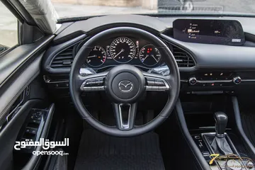  14 Mazda 3 2023 Skyactiv   السيارة وارد و كفالة الشركة و صيانة الشركة و قطعت مسافة 11,000 كم فقط