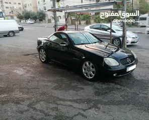  3 مرسيدس SLK 2003 لون أسود ملوكي، كشف، ترخيص جديد وارد غرغور مالك ثالث من الوكالة