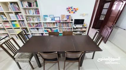  2 Good quality dining table and 7 chairs