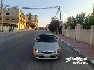  1 مازدا 323 اتماتك فتحه اصليه تحفه بمعنا الكلمه بسعر حرق 29500 ألف نقدا بدل وارد فحص نخب