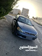  5 كيا ريو 2001