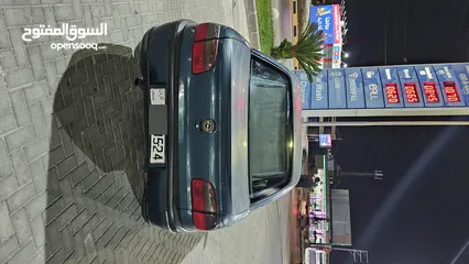  11 اوبل اوميجا للبيع السياره ب حاجه ل صيانه (القير + صنوبرصات) كاوشك جديد كراسي كهرباء السياره فحص خالي