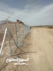  1 تركيب شبك وشيك وجابيون وربراب وإنشاء جدران حجرية