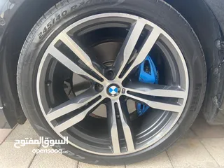 25 BMW 740i M package fully loaded (Black edition) وارد الوكالة بنزين مميزه