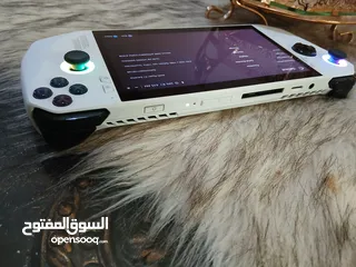  5 ASUS ROG Ally (Q2 2023) RC71L AMD Ryzen Z1 Extreme 8-Cores AMD Radeon 780M 512 جيجا حالة الجديد
