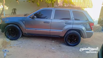  2 جيب شيروكي ليمتد للبيع موديل 2007 فحص جيد خلفي قصعات امامي ماتور 4700cc  منتهي ترخيص صحتها كويسه